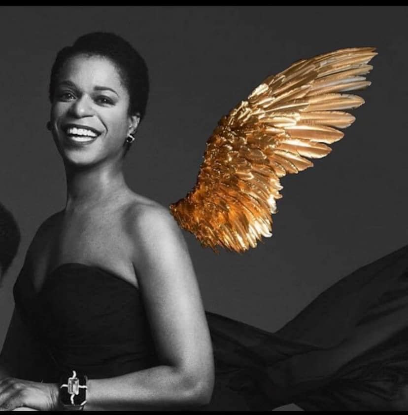 Angel wing photo art for dance and performance photography, black and white portrait with golden wing accent.