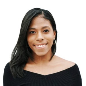 Experienced dance instructor smiling at AbunDance NYC studio.